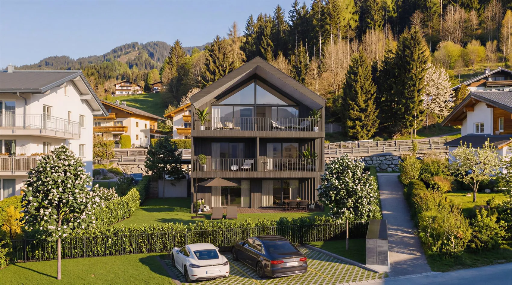 4-LIVING Bruckberg — Tagansicht der Front mit Bergpanorama